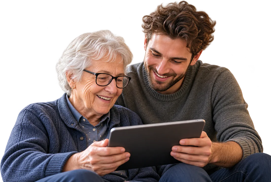 Eine ältere Dame und ein junger Mann entdecken gemeinsam ein Tablet